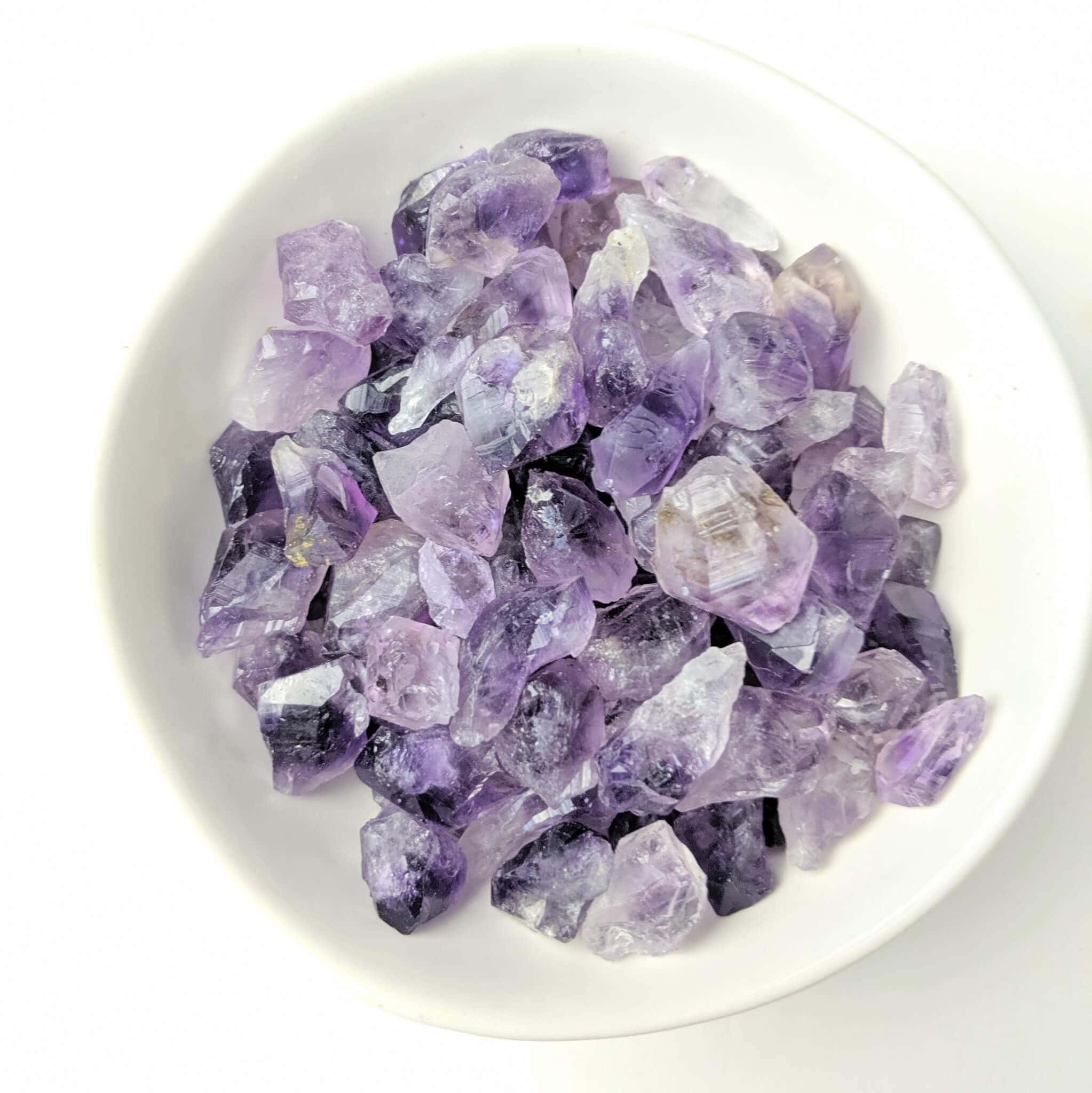 Amethyst Crystal Points in a White Bowl Top View