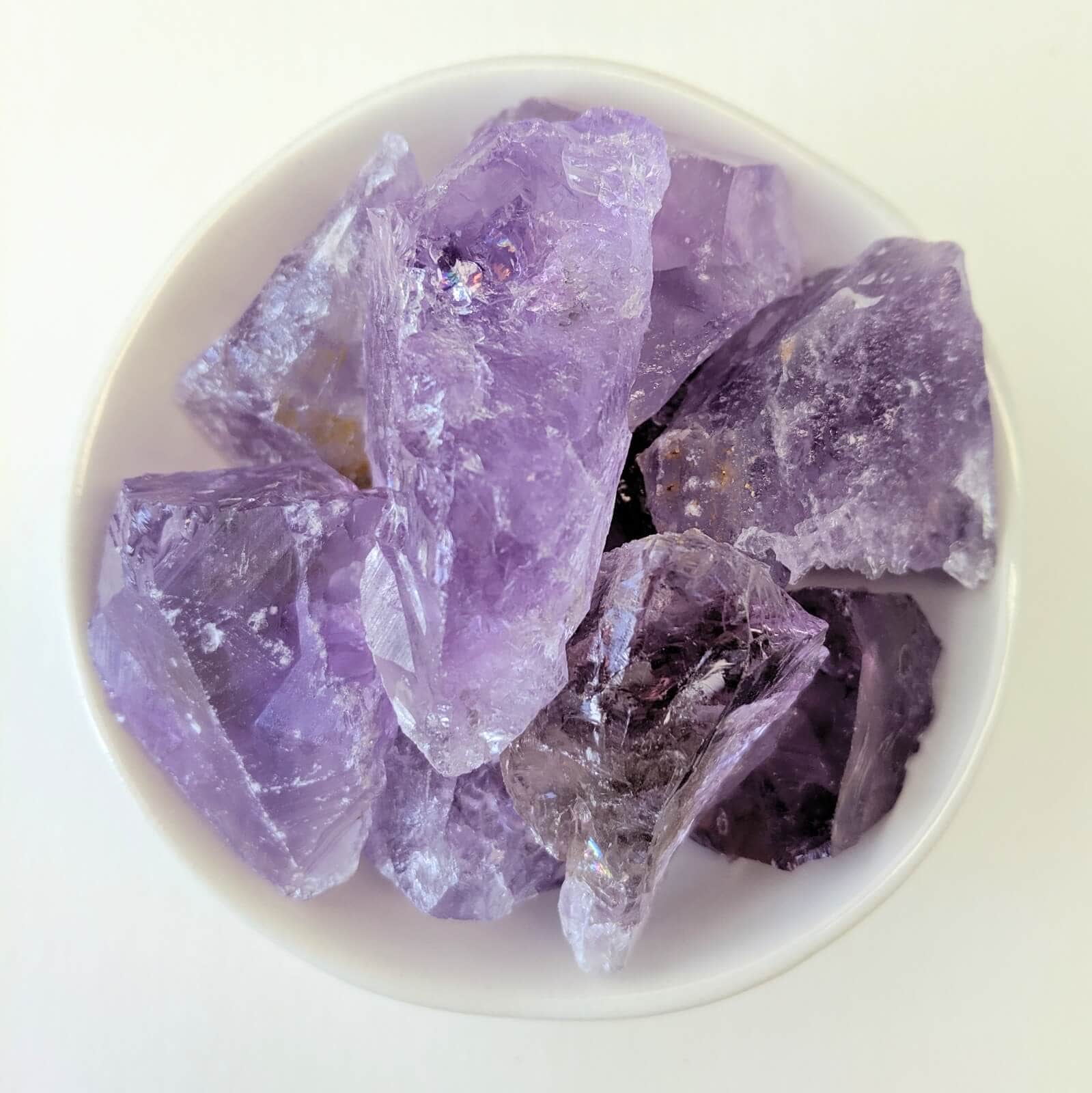 Amethyst Raw Crystals In A White Bowl - Top View