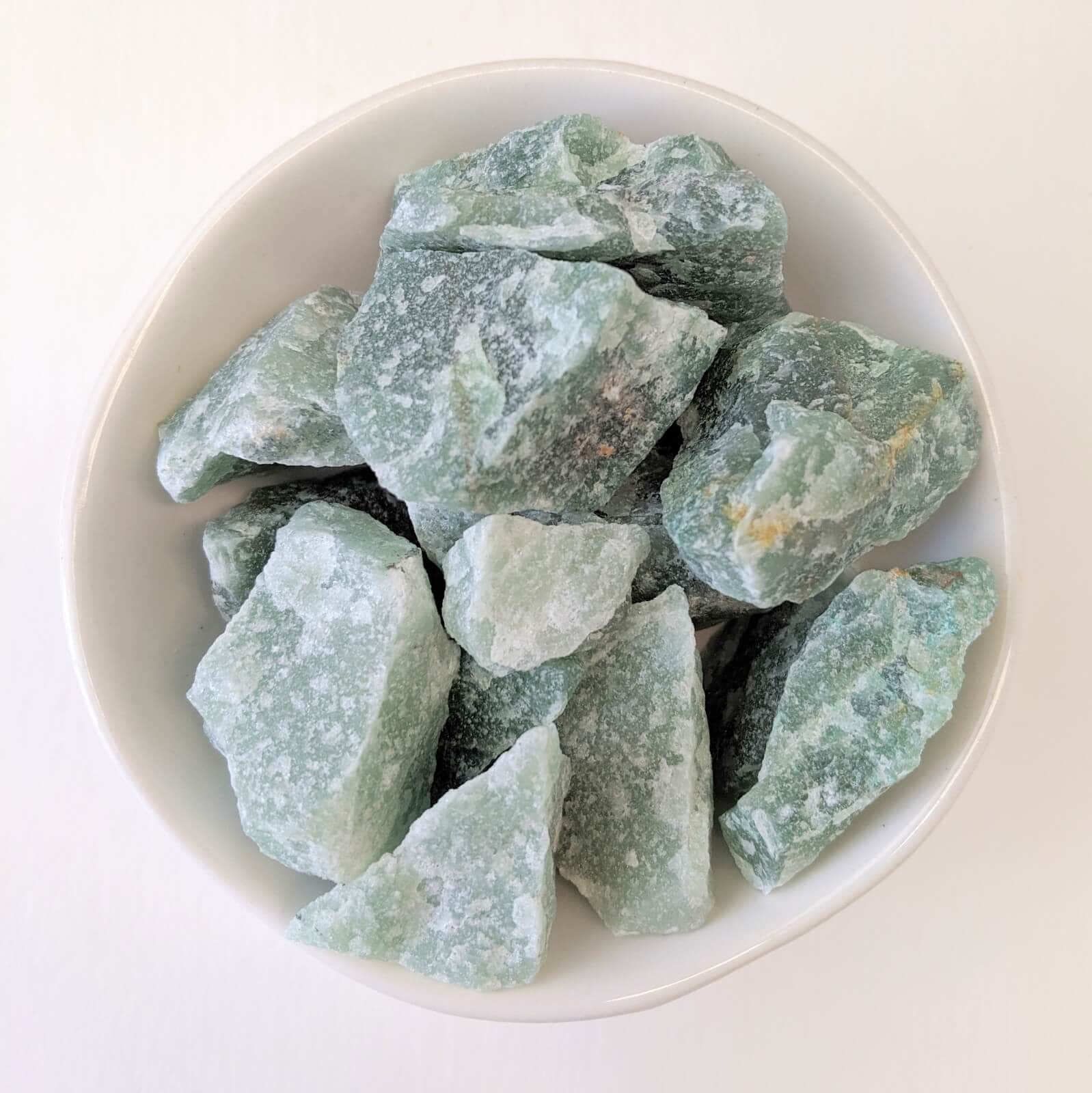Aventurine Green Crystals Raw In A White Bowl - Top View