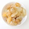 Citrine Crystal Tumble Stones in a White Bowl Top View